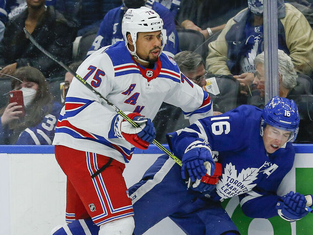 TORONTO, ON - NOVEMBER 18: New York Rangers right wing Ryan Reaves (75) rides Toronto Maple Leafs center Mitchell Marner (16) along the boards. Toronto Maple Leafs vs New York Rangers during 1st period play NHL regular season action at Scotiabank Arena in Toronto. Toronto Star/Rick Madonik (Rick Madonik/Toronto Star via Getty Images)