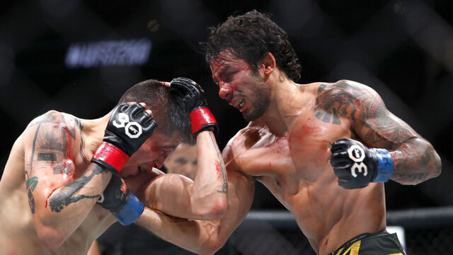 LAS VEGAS, NEVADA - JULY 08: Alexandre Pantoja (R) battles with UFC flyweight champion Brandon Moreno during UFC 290 at T-Mobile Arena on July 08, 2023 in Las Vegas, Nevada. Pantoja won the title by split decision.