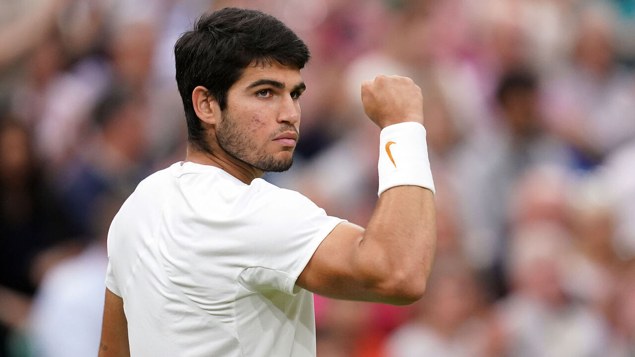 Carlos Alcaraz celebrates winning the second set during the Gentlemen's Singles semi-final match against Daniil Medvedev on day twelve of the 2023 Wimbledon Championships at the All England Lawn Tennis and Croquet Club in Wimbledon. Picture date: Friday July 14, 2023.