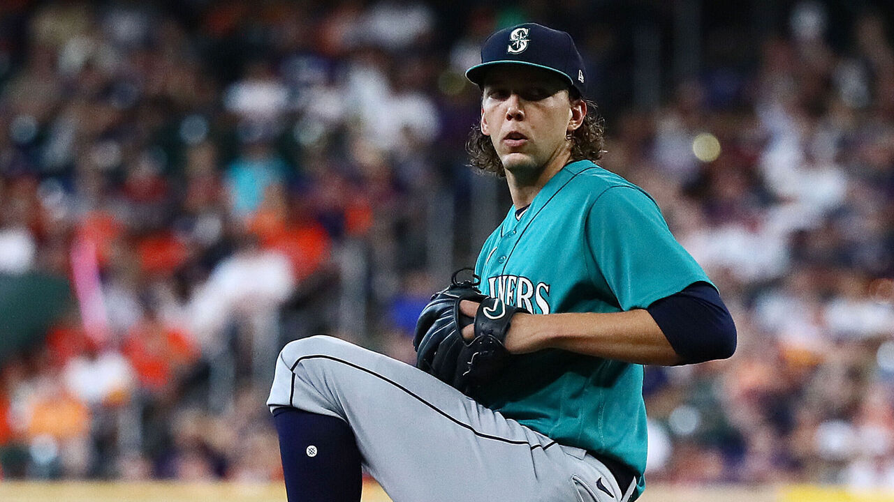 HOUSTON, TEXAS - JULY 09: Logan Gilbert #36 of the Seattle Mariners pitches in the first inning against the Houston Astros at Minute Maid Park on July 09, 2023 in Houston, Texas.