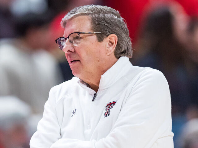 LUBBOCK, TEXAS - FEBRUARY 11: Head coach Mark Adams of the Texas Tech Red Raiders looks to the bench during the second half of the college basketball game against the Kansas State Wildcats at United Supermarkets Arena on February 11, 2023 in Lubbock, Texas.