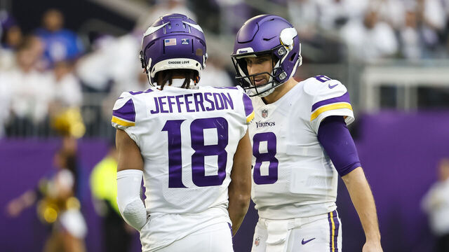 MINNEAPOLIS, MN - DECEMBER 24: Kirk Cousins #8 talks to Justin Jefferson #18 of the Minnesota Vikings in the first quarter of the game against the New York Giants at U.S. Bank Stadium on December 24, 2022 in Minneapolis, Minnesota. The Vikings defeated the Giants 27-24.