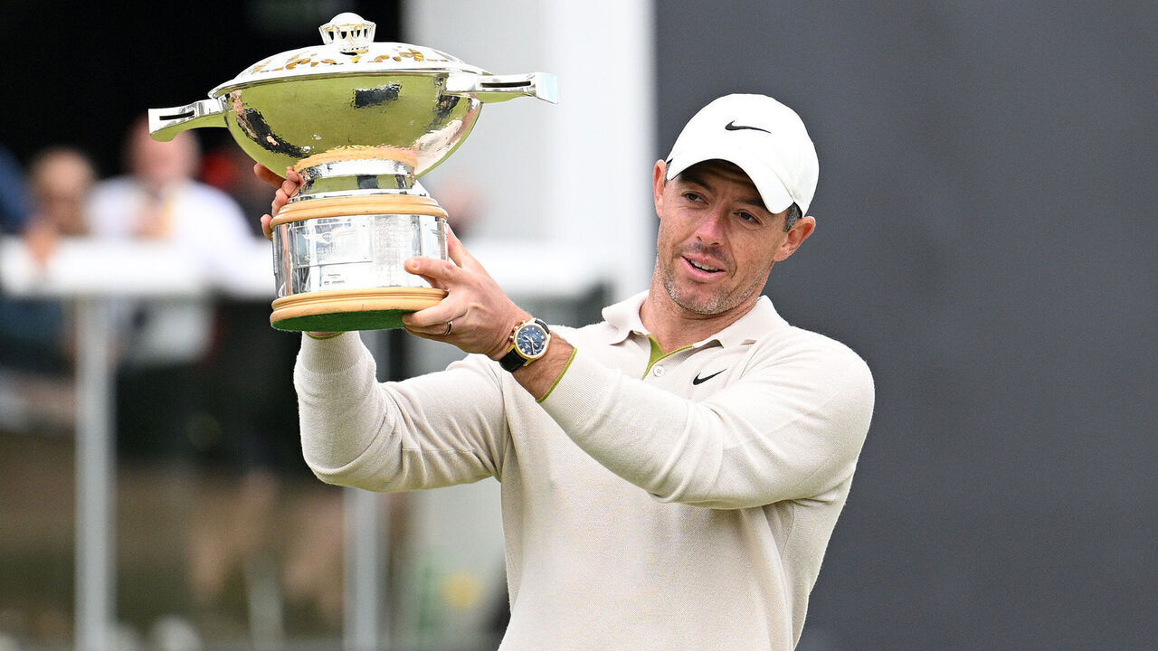 NORTH BERWICK, SCOTLAND - JULY 16: Rory McIlroy of Northern Ireland celebrates with the Genesis Scottish Open trophy on the 18th green after winning the tournament during Day Four of the Genesis Scottish Open at The Renaissance Club on July 16, 2023 in United Kingdom.