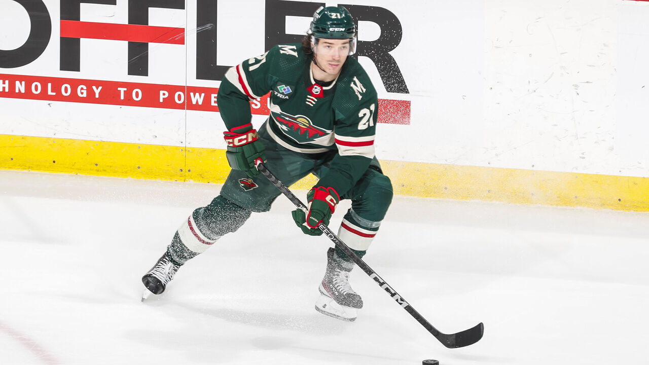 ST. PAUL, MN - APRIL 11: Brandon Duhaime #21 of the Minnesota Wild skates with the puck in the second period of the game against the Winnipeg Jets at Xcel Energy Center on April 11, 2023 in St. Paul, Minnesota.