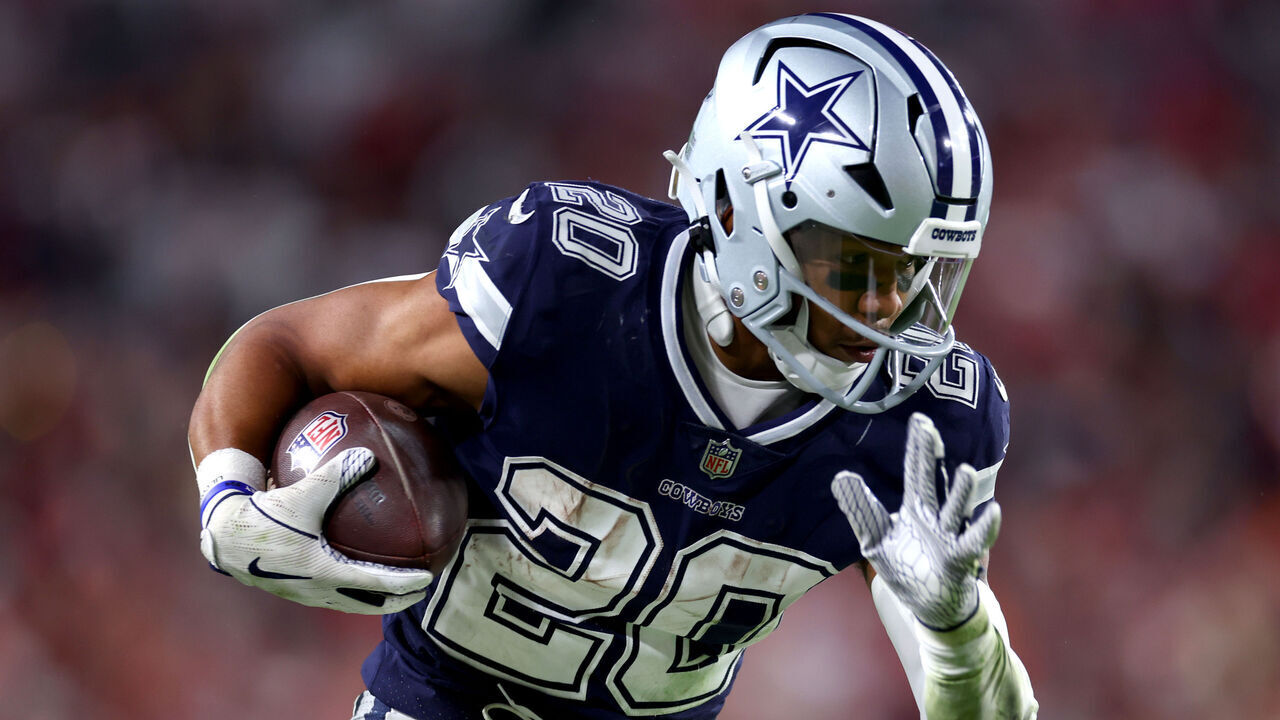 TAMPA, FLORIDA - JANUARY 16: Tony Pollard #20 of the Dallas Cowboys carries the ball against the Tampa Bay Buccaneers during the third quarter in the NFC Wild Card playoff game at Raymond James Stadium on January 16, 2023 in Tampa, Florida.