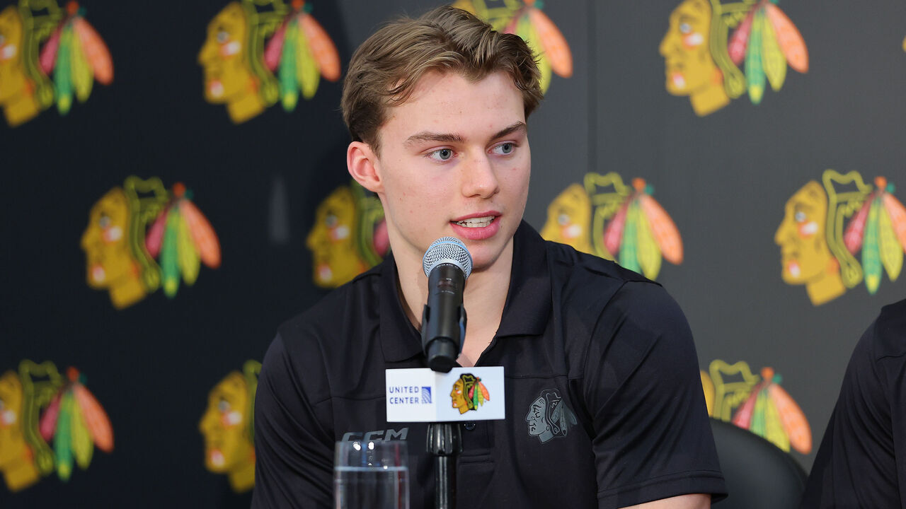 CHICAGO, ILLINOIS - JUNE 30: Connor Bedard of the Chicago Blackhawks answers questions from the media during a introductory press conference at Fifth Third Arena on June 30, 2023 in Chicago, Illinois.