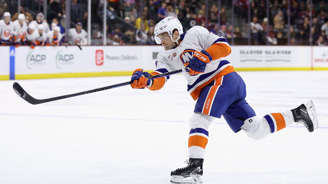 TEMPE, ARIZONA - DECEMBER 16: Oliver Wahlstrom #26 of the New York Islanders shoots the puck against the Arizona Coyotes during the third period of the NHL game at Mullett Arena on December 16, 2022 in Tempe, Arizona. The Coyotes defeated the Islanders 5-4.