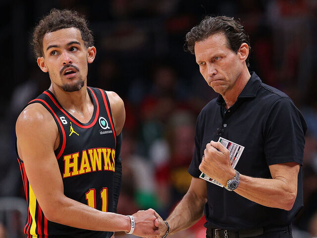 ATLANTA, GEORGIA - APRIL 21: Head coach Quin Snyder of the Atlanta Hawks reacts with Trae Young #11 against the Boston Celtics during the fourth quarter of Game Three of the Eastern Conference First Round Playoffs at State Farm Arena on April 21, 2023 in Atlanta, Georgia.