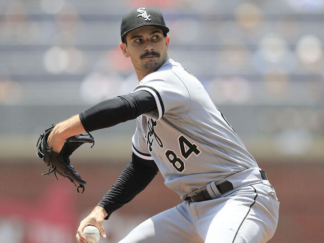 ATLANTA, GA - JULY 16: Chicago White Sox and Georgia native starting pitcher Dylan Cease (84) delivers a pitch during the Sunday afternoon MLB game between the Atlanta Braves and the Chicago White Sox on July 16, 2023 at Truist Park in Atlanta, Georgia.
