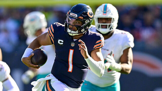 CHICAGO, ILLINOIS - NOVEMBER 06: Justin Fields #1 of the Chicago Bears runs the ball during the second half in the game against the Miami Dolphins at Soldier Field on November 06, 2022 in Chicago, Illinois.