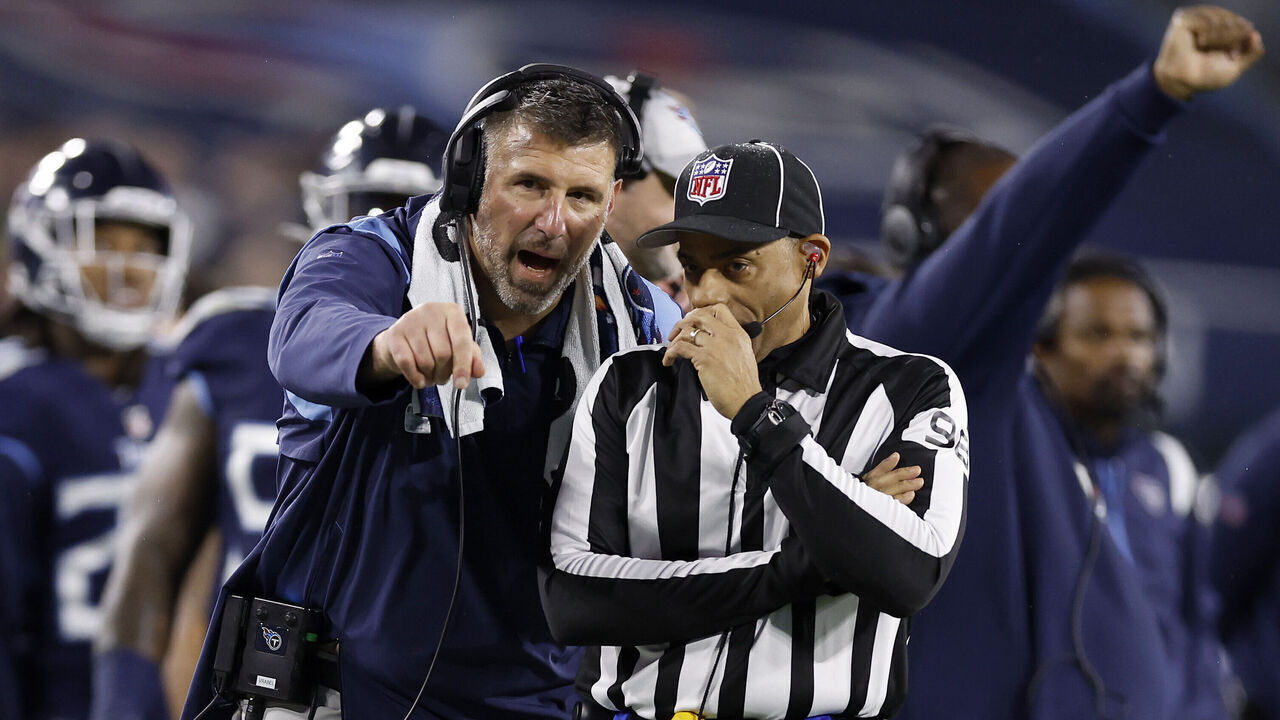 NASHVILLE, TENNESSEE - DECEMBER 29: Head coach Mike Vrabel of the Tennessee Titans argues with line judge Greg Bradley #98 against the Dallas Cowboys during the first quarter of the game at Nissan Stadium on December 29, 2022 in Nashville, Tennessee.