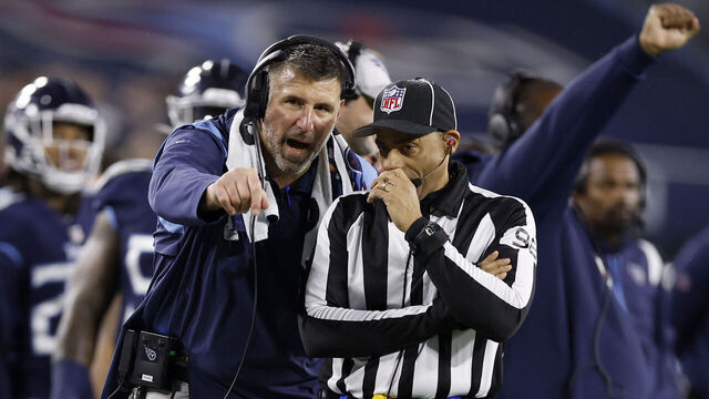 NASHVILLE, TENNESSEE - DECEMBER 29: Head coach Mike Vrabel of the Tennessee Titans argues with line judge Greg Bradley #98 against the Dallas Cowboys during the first quarter of the game at Nissan Stadium on December 29, 2022 in Nashville, Tennessee.