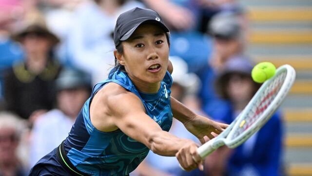 China's Zhang Shuai returns to Britain's Harriet Dart during their women's singles round of 32 tennis match at the Rothesay Eastbourne International tennis tournament in Eastbourne, southern England, on June 26, 2023.
