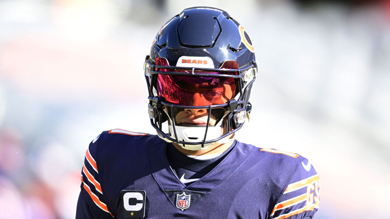 CHICAGO, ILLINOIS - DECEMBER 24: Justin Fields #1 of the Chicago Bears warms up prior to the game against the Buffalo Bills at Soldier Field on December 24, 2022 in Chicago, Illinois.