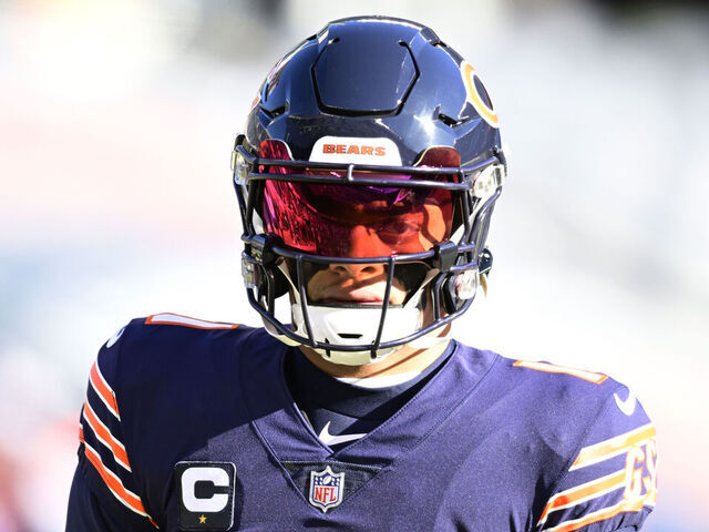 CHICAGO, ILLINOIS - DECEMBER 24: Justin Fields #1 of the Chicago Bears warms up prior to the game against the Buffalo Bills at Soldier Field on December 24, 2022 in Chicago, Illinois.