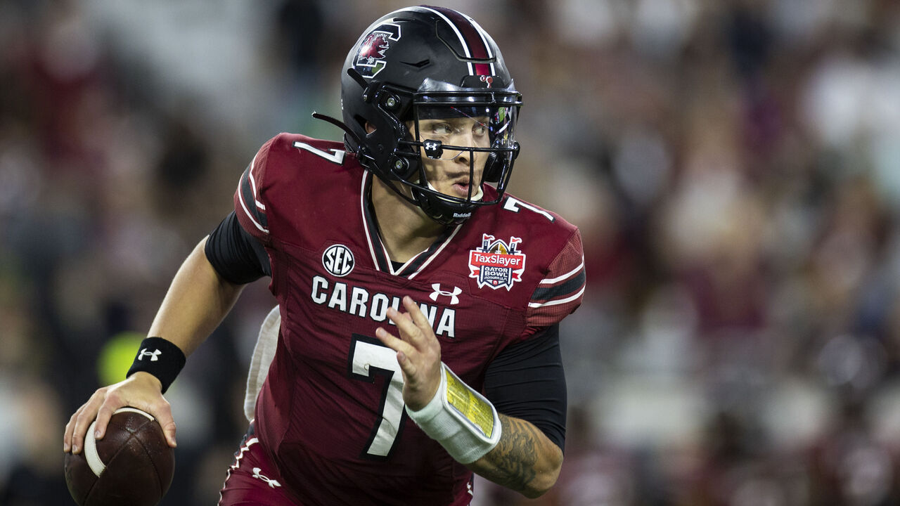JACKSONVILLE, FLORIDA - DECEMBER 30: Spencer Rattler #7 of the South Carolina Gamecocks looks to pass against the Notre Dame Fighting Irish during the second half of the TaxSlayer Gator Bowl at TIAA Bank Field on December 30, 2022 in Jacksonville, Florida.