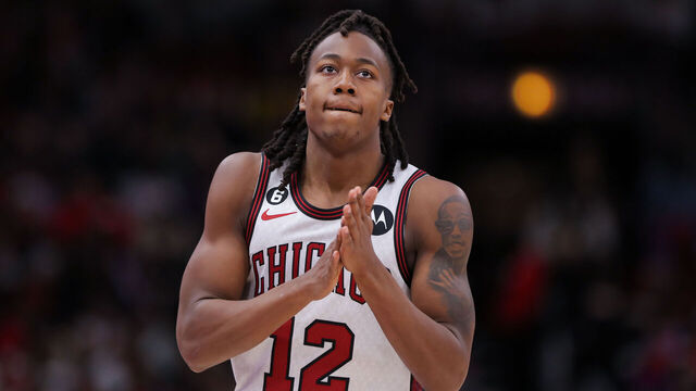 CHICAGO, IL - APRIL 09: Chicago Bulls guard Ayo Dosunmu (12) looks on during a NBA game between the Detroit Pistons and the Chicago Bulls on April 9, 2023 at the United Center in Chicago, IL.