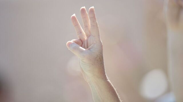 Auto Racing: NASCAR Daytona 500: Closeup of fans holding up three fingers during memorial for late driver of #3 car Dale Earnhardt Sr. before race at Daytona International Speedway. 10th anniversary of Earnhardt's death.Daytona Beach, FL 2/20/2011CREDIT: Bill Frakes