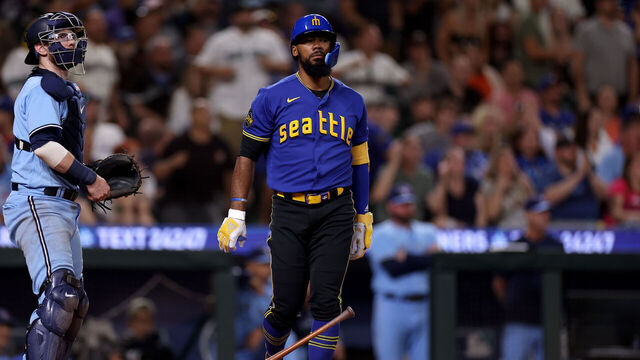 SEATTLE, WASHINGTON - JULY 21: Teoscar Hernandez #35 of the Seattle Mariners celebrates his walk-off single against the Toronto Blue Jays during the ninth inning at T-Mobile Park on July 21, 2023 in Seattle, Washington.
