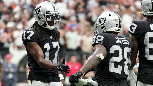 LAS VEGAS, NEVADA - OCTOBER 02: Davante Adams #17 and Josh Jacobs #28 of the Las Vegas Raiders celebrate after Jacobs scored a touchdown in the second quarter against the Denver Broncos at Allegiant Stadium on October 02, 2022 in Las Vegas, Nevada.