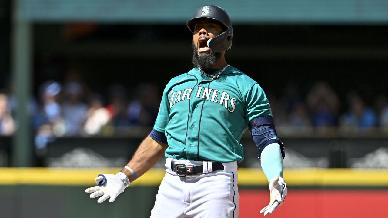 SEATTLE, WASHINGTON - JULY 22: Teoscar Hernandez #35 of the Seattle Mariners reacts after hitting a two-run RBI double against the Toronto Blue Jays at T-Mobile Park on July 22, 2023 in Seattle, Washington. The Seattle Mariners won 9-8.