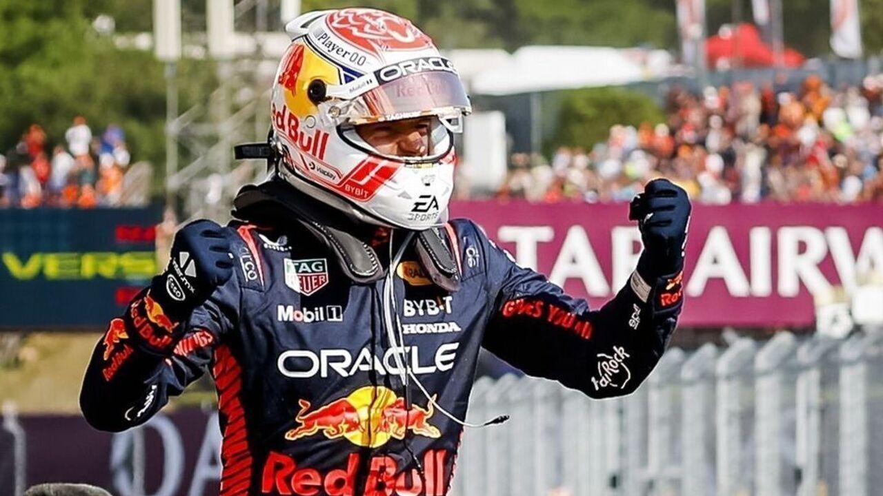 BUDAPEST - Max Verstappen (Red Bull Racing) cheers after winning the Hungarian Grand Prix at the Hungaroring. ANP REMKO DE WAAL