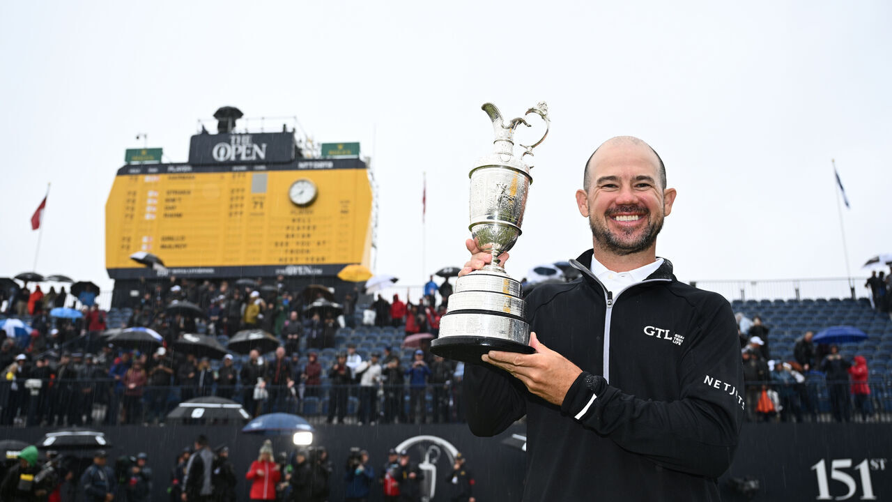 HOYLAKE, ENGLAND - JULY 23: Brian Harman of the United States poses with the Claret Jug on the 18th Green following victory on dDay Four of The 151st Open at Royal Liverpool Golf Club on July 23, 2023 in Hoylake, England.