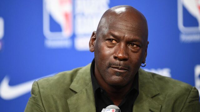 Former NBA star and owner of Charlotte Hornets team Michael Jordan looks on as he addresses a press conference ahead of the NBA basketball match between Milwaukee Bucks and Charlotte Hornets at The AccorHotels Arena in Paris on January 24, 2020.