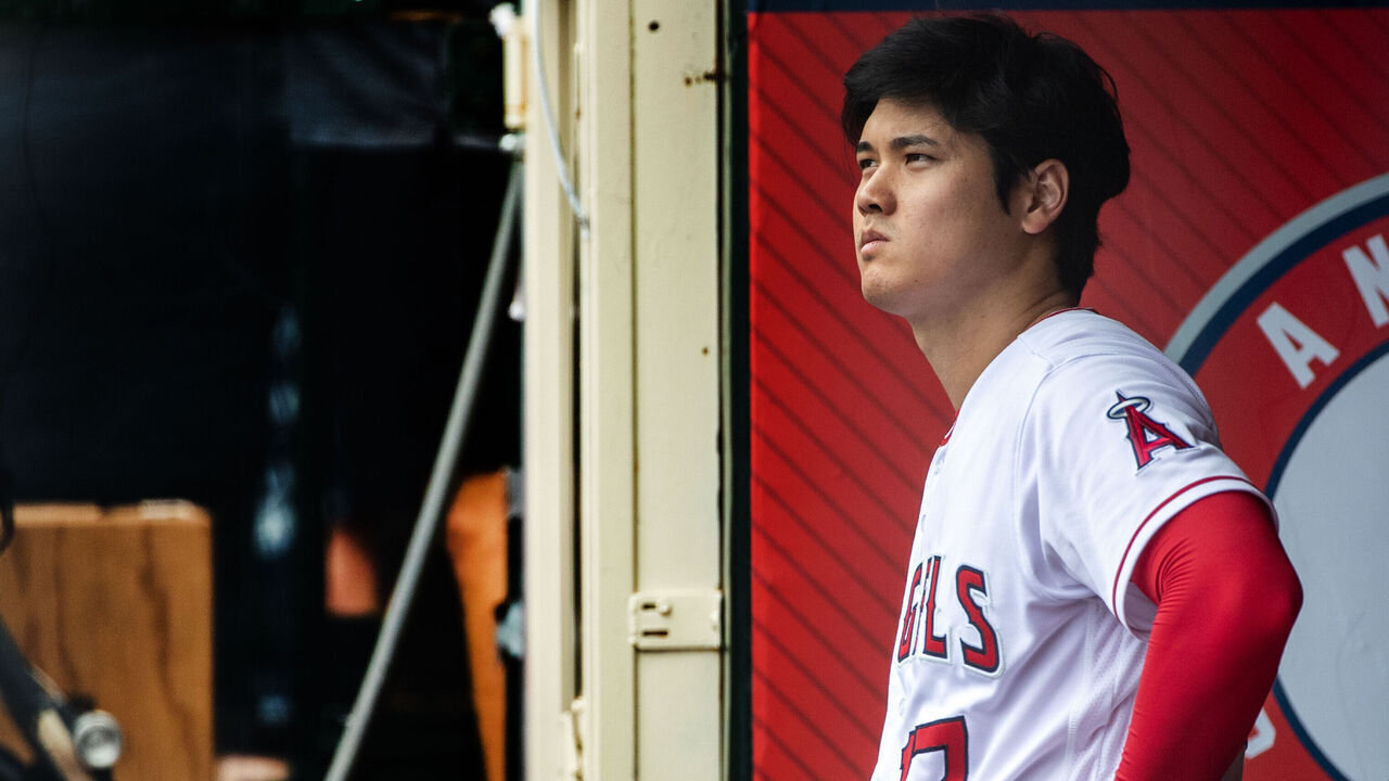 ANAHEIM, CA - JULY 23, 2023: Los Angeles Angels DH Shohei Ohtani (17) watches the top of the first inning from the dugout against the Pittsburgh Pirates on July 23, 2023 in Anaheim, California. (Gina Ferazzi / Los Angeles Times via Getty Images)