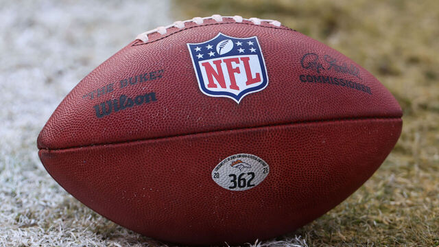 KANSAS CITY, MO - JANUARY 01: A view of the NFL logo on a football before an AFC West game between the Denver Broncos and Kansas City Chiefs on January 1, 2023 at GEHA Field at.Arrowhead Stadium in Kansas City, MO.