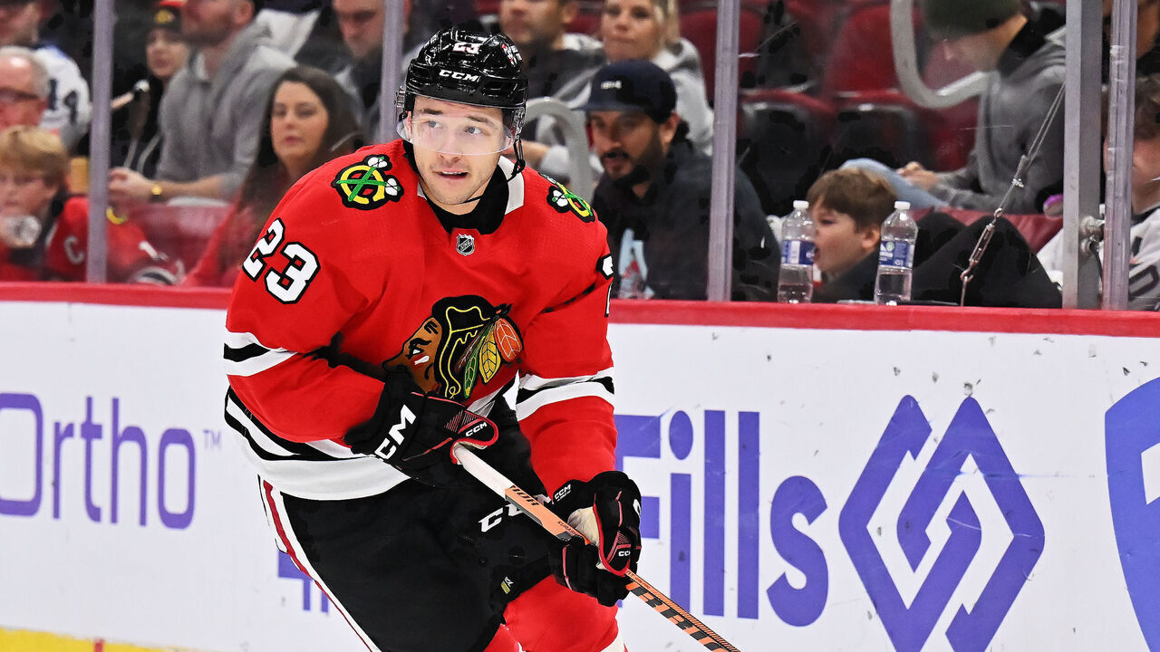 CHICAGO, ILLINOIS - DECEMBER 09: Philipp Kurashev #23 of the Chicago Blackhawks skates against the Winnipeg Jets on December 09, 2022 at United Center in Chicago, Illinois.