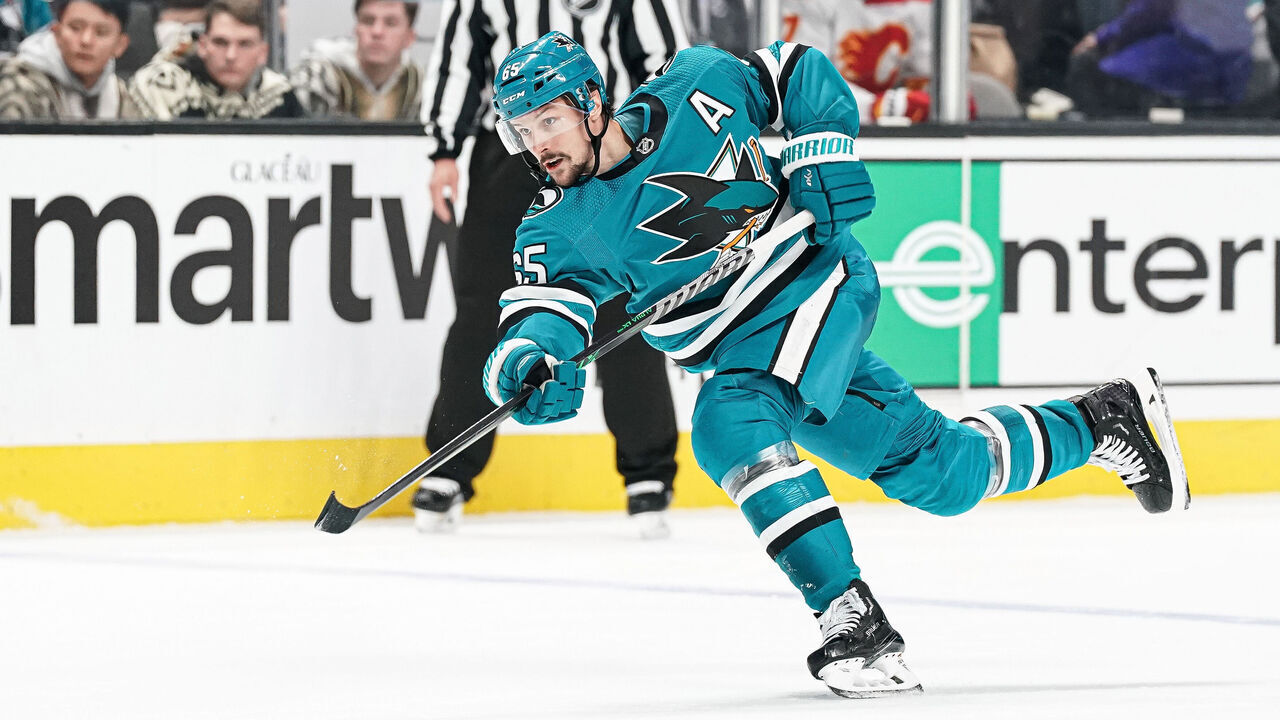 SAN JOSE, CA - DECEMBER 20: Erik Karlsson #65 of the San Jose Sharks takes a shot on goal against the Calgary Flames at SAP Center on December 20, 2022 in San Jose, California.