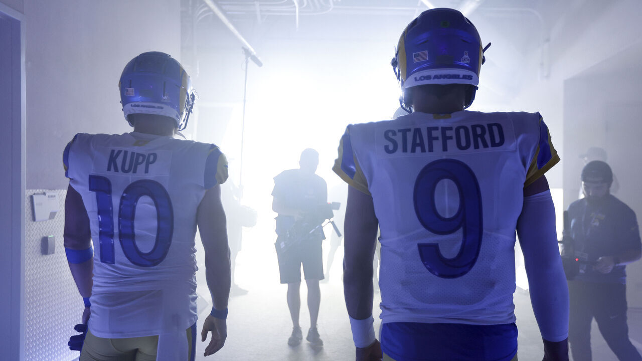 INGLEWOOD, CALIFORNIA - OCTOBER 09: Cooper Kupp #10 of the Los Angeles Rams and Matthew Stafford #9 of the Los Angeles Rams walk in the tunnel prior to an NFL football game against the Dallas Cowboys at SoFi Stadium on October 09, 2022 in Inglewood, California.