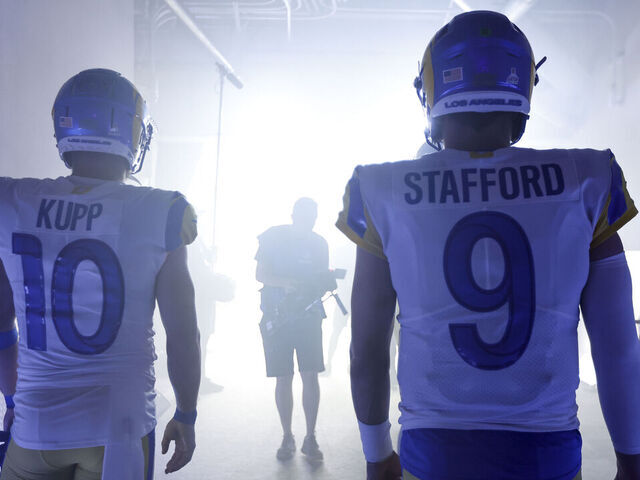 INGLEWOOD, CALIFORNIA - OCTOBER 09: Cooper Kupp #10 of the Los Angeles Rams and Matthew Stafford #9 of the Los Angeles Rams walk in the tunnel prior to an NFL football game against the Dallas Cowboys at SoFi Stadium on October 09, 2022 in Inglewood, California.