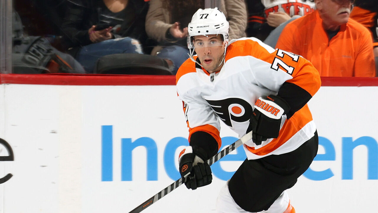 PHILADELPHIA, PENNSYLVANIA - MARCH 18: Tony DeAngelo #77 of the Philadelphia Flyers skates the puck against the Carolina Hurricanes at the Wells Fargo Center on March 18, 2023 in Philadelphia, Pennsylvania.