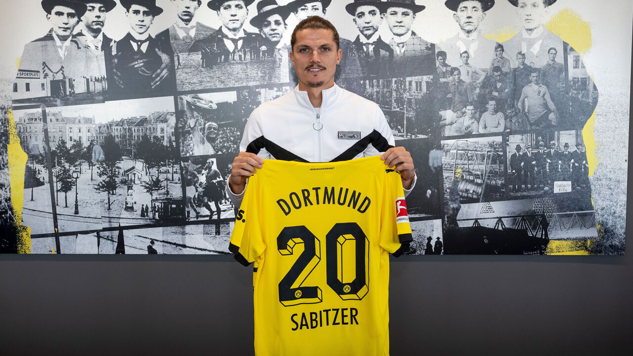 DORTMUND, GERMANY - JULY 24: Marcel Sabitzer of Borussia Dortmund poses with a jersey after he signed a contract with the club on July 24, 2023 in Dortmund, Germany. The Austrian completed his medical check in Dortmund and then signed a contract until June 2027.