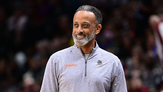 DALLAS, TX - MARCH 31: Kenny Brooks head coach of the Virginia Tech Hokies watches his team against the Louisiana State Tigers during the semifinals of the NCAA Womens Basketball Tournament Final Four at American Airlines Center on March 31, 2023 in Dallas, Texas.