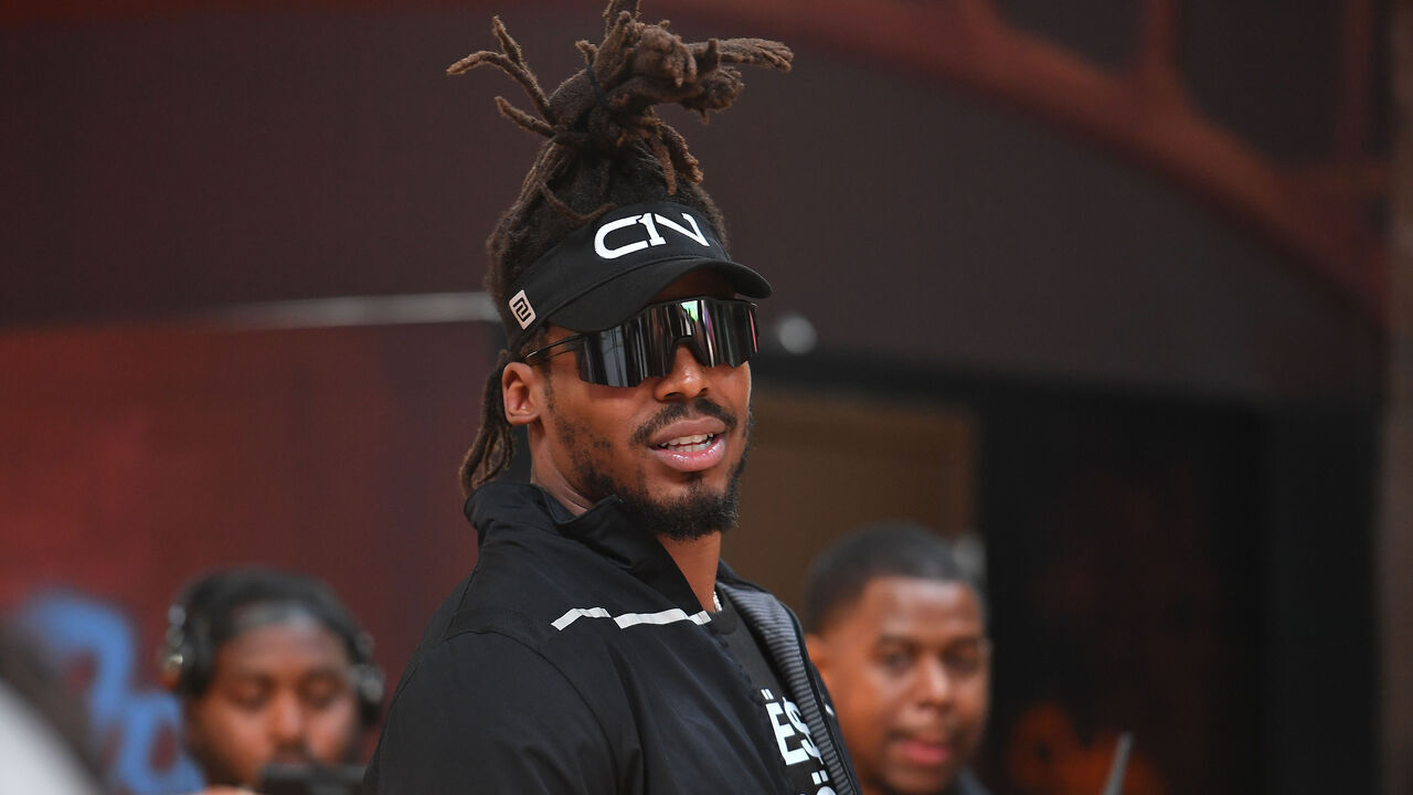 ATLANTA, GEORGIA - APRIL 30: Cam Newton attends 2022 Huncho Day Celebrity Football Game during Fan Controlled Football Season v2.0 - Week Three at Pullman Yards on April 30, 2022 in Atlanta, Georgia.