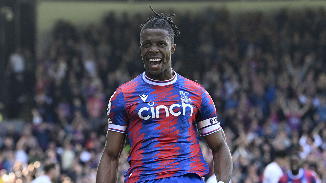 Crystal Palace's Ivorian striker Wilfried Zaha celebrates after scoring their second goal during the English Premier League football match between Crystal Palace and West Ham United at Selhurst Park in south London on April 29, 2023.