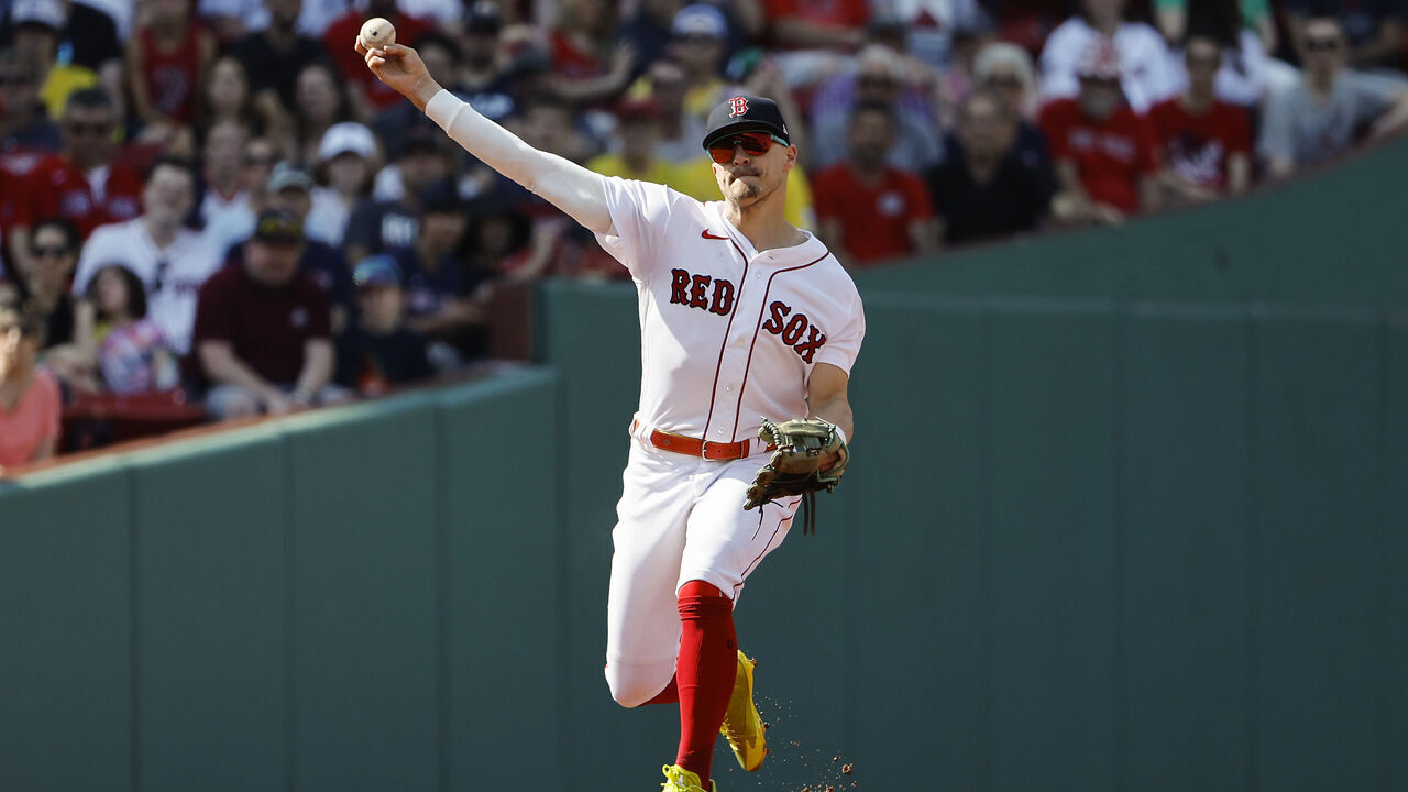 BOSTON, MA - JULY 8: Enrique Hernandez #5 of the Boston Red Sox throws to first against the Oakland Athletics during the first inning at Fenway Park on July 8, 2023 in Boston, Massachusetts.