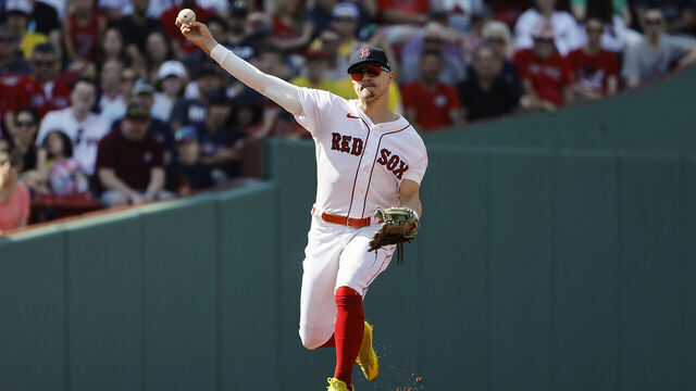 BOSTON, MA - JULY 8: Enrique Hernandez #5 of the Boston Red Sox throws to first against the Oakland Athletics during the first inning at Fenway Park on July 8, 2023 in Boston, Massachusetts.
