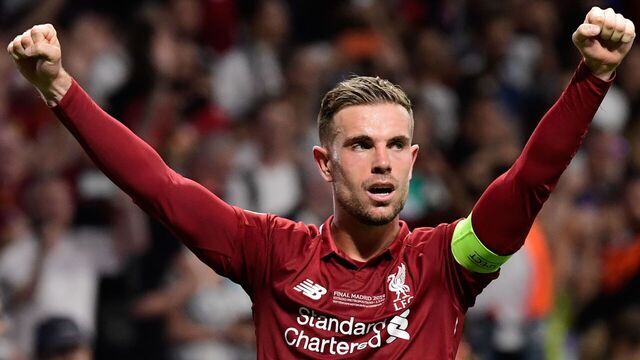 TOPSHOT - Liverpool's English midfielder Jordan Henderson reacts after winning the UEFA Champions League final football match between Liverpool and Tottenham Hotspur at the Wanda Metropolitano Stadium in Madrid on June 1, 2019.