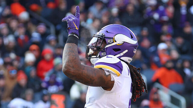 CHICAGO, ILLINOIS - JANUARY 08: Alexander Mattison #2 of the Minnesota Vikings celebrates a touchdown against the Chicago Bears during the fourth quarter at Soldier Field on January 08, 2023 in Chicago, Illinois.
