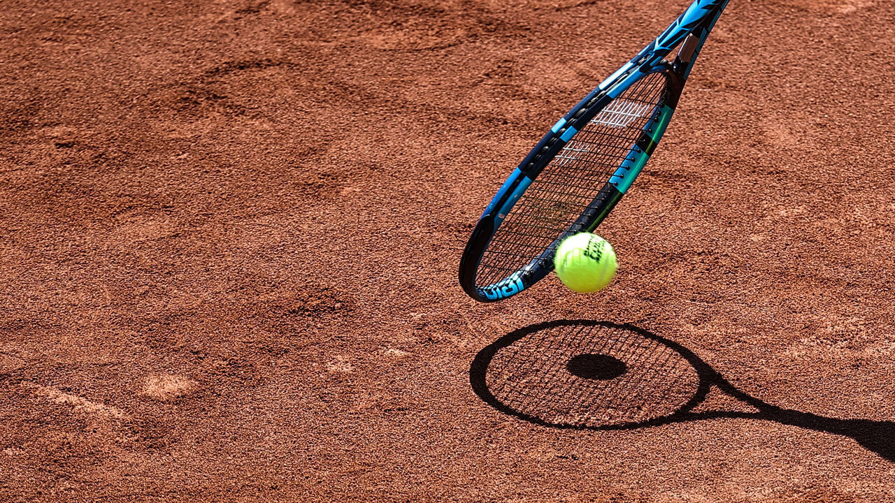 ISTANBUL, TURKIYE - APRIL 20: A silhouette of racket during TEB BNP Paribas Tennis Championship Istanbul women's clay court tournament at TTF Istanbul Tennis Center, Istanbul, Turkiye on April 20, 2022.