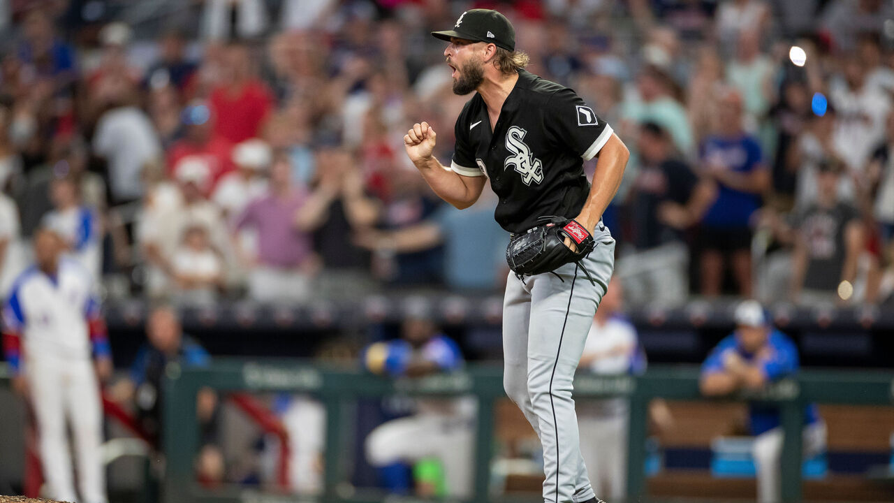 ATLANTA, GA - JULY 15: Kendall Graveman #49 of the Chicago White Sox celebrates after the final out for the save during the ninth inning against the Atlanta Braves on July 15, 2023 at Truist Park in Atlanta, Georgia.