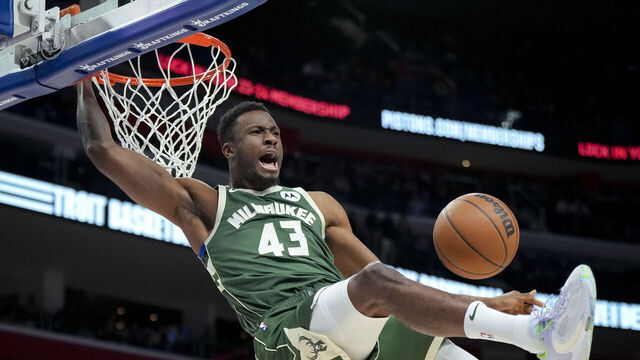 DETROIT, MICHIGAN - MARCH 27: Thanasis Antetokounmpo #43 of the Milwaukee Bucks dunks the ball against the Detroit Pistons at Little Caesars Arena on March 27, 2023 in Detroit, Michigan.