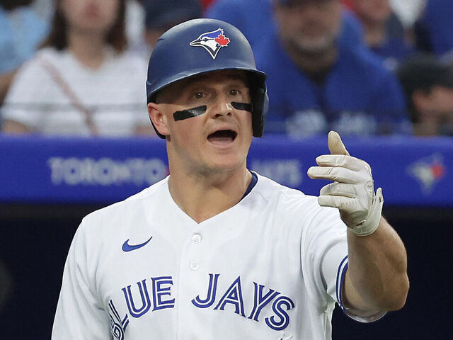 TORONTO, ON - JULY 28 - Toronto Blue Jays third baseman Matt Chapman (26) disputes a call with umpire Mike Estabrook (83) as the Toronto Blue Jays beat the Los Angeles Angels 4-1 at Rogers Centre in Toronto. July 28, 2023. (Steve Russell/Toronto Star via Getty Images)