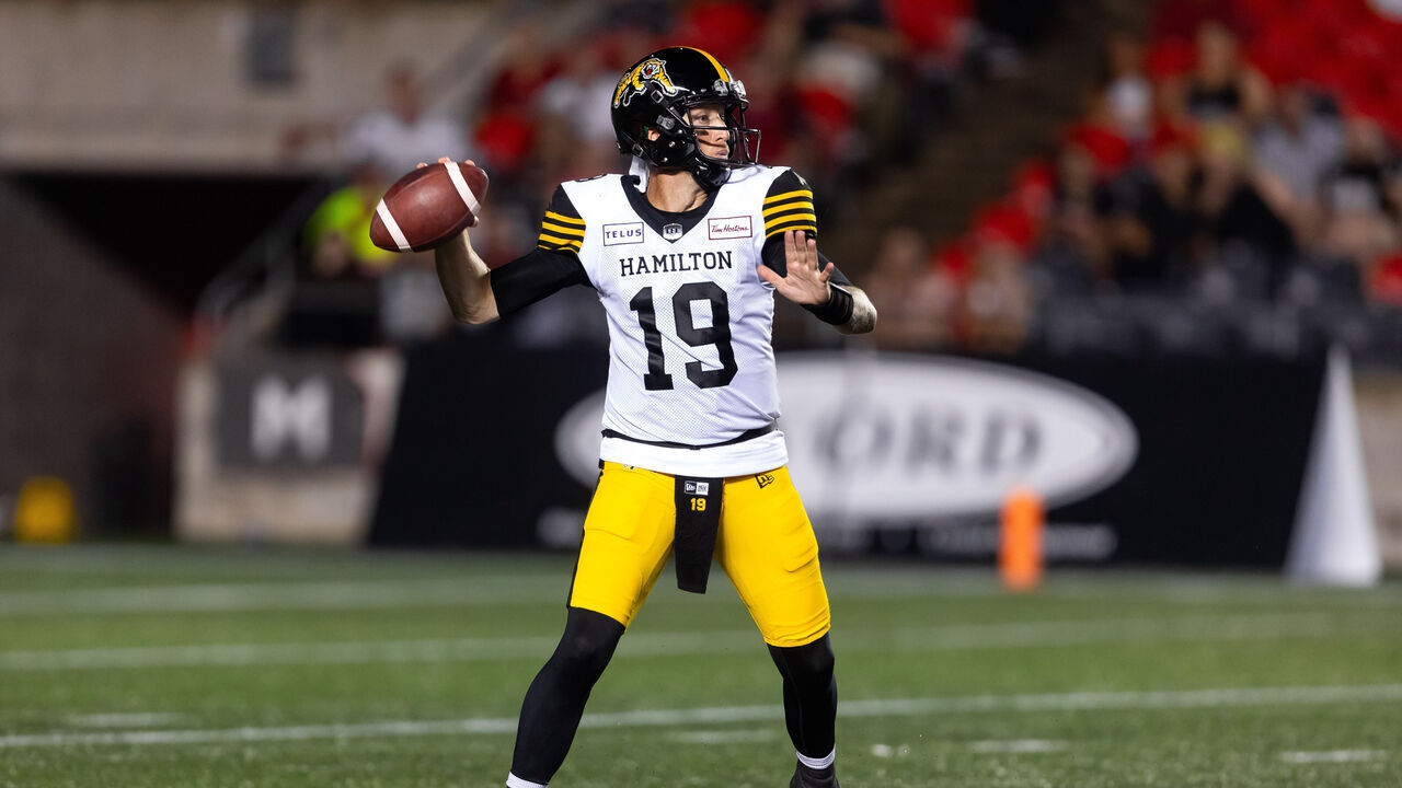 OTTAWA, ON - JULY 28: Hamilton Tiger-Cats quarterback Bo Levi Mitchell (19) looks to throw a pass during Canadian Football League action between the Hamilton Tiger-Cats and Ottawa Redblacks on July 28, 2023, at TD Place at Lansdowne Park in Ottawa, ON, Canada.