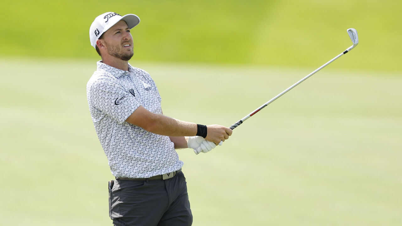 BLAINE, MINNESOTA - JULY 29: Lee Hodges of the United States plays an approach shot on the 14th hole during the third round of the 3M Open at TPC Twin Cities on July 29, 2023 in Blaine, Minnesota.