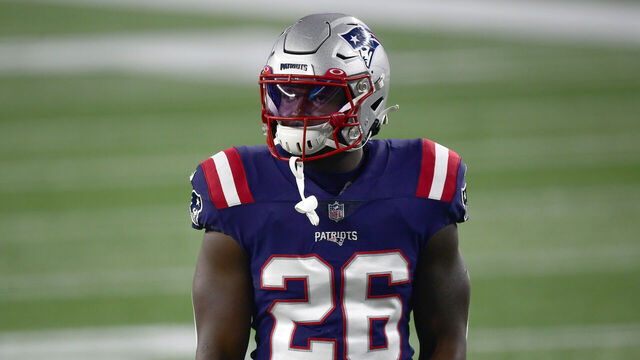 FOXBOROUGH, MA - DECEMBER 28: Sony Michel #26 of the New England Patriots warms up before a game against the Buffalo Bills at Gillette Stadium on December 28, 2020 in Foxborough, Massachusetts.
